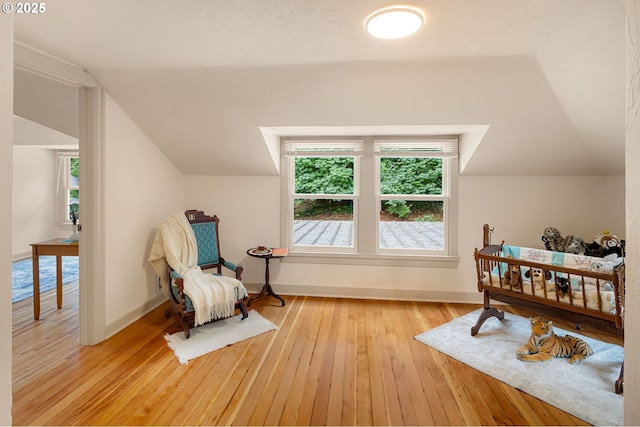 54 W 31st Ave, Eugene, OR 97405 - sitting room with vaulted ceiling and wood-type flooring