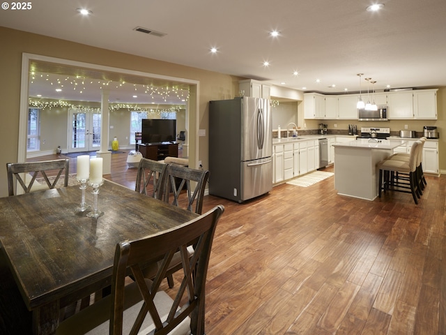 2605 NE 189th St, Ridgefield, WA 98642 - dining space featuring visible vents, wood finished floors, and recessed lighting