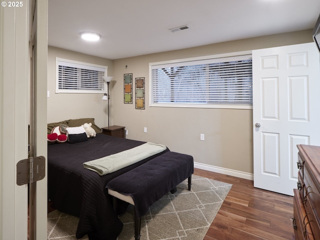 2605 NE 189th St, Ridgefield, WA 98642 - bedroom with dark wood-style flooring, visible vents, and baseboards
