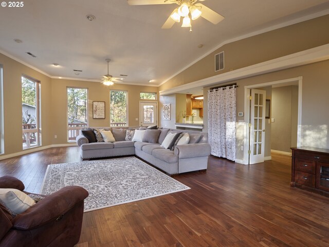 2605 NE 189th St, Ridgefield, WA 98642 - living room with visible vents, vaulted ceiling, and dark wood-style flooring