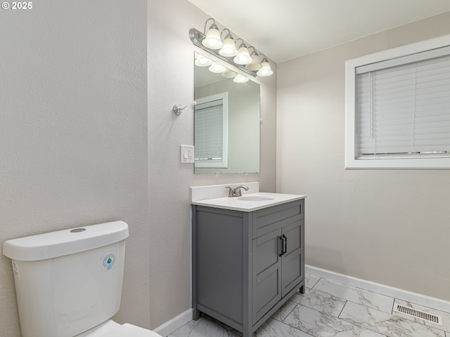 11421 SE Pardee St, Portland, OR 97266 - half bath featuring marble finish flooring, baseboards, and toilet
