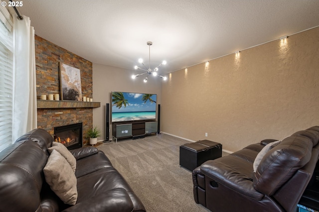 carpeted living room with a textured ceiling, a chandelier, and a stone fireplace