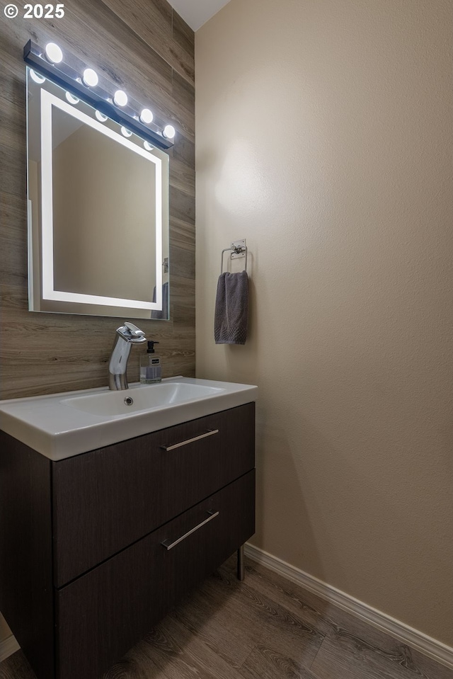 bathroom featuring hardwood / wood-style floors and vanity