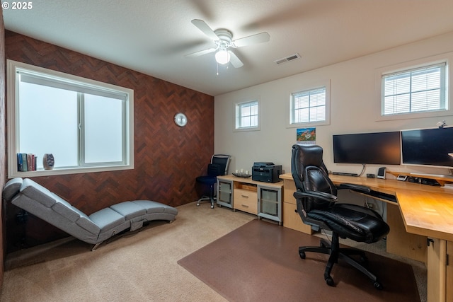 office area with carpet flooring and ceiling fan