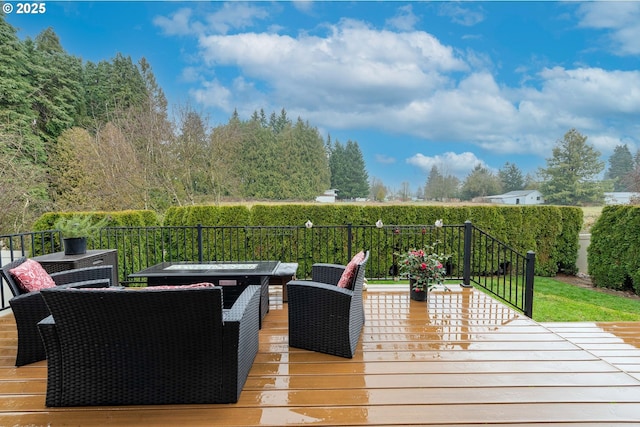 wooden terrace featuring an outdoor living space