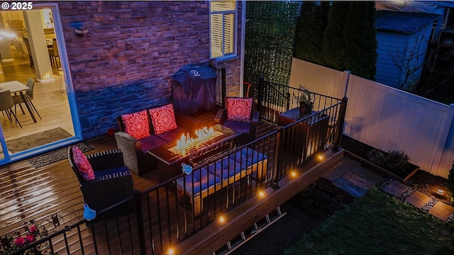 exterior space featuring an outdoor fire pit