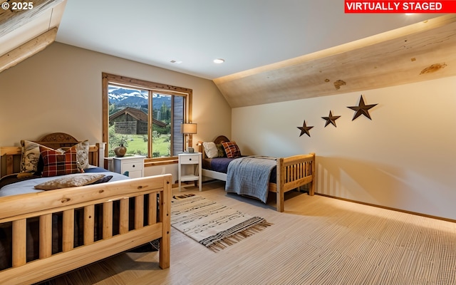 14023 Hawks Beard Unit Gm164, Black Butte Ranch, OR 97759 - bedroom featuring lofted ceiling, wood finished floors, baseboards, and recessed lighting