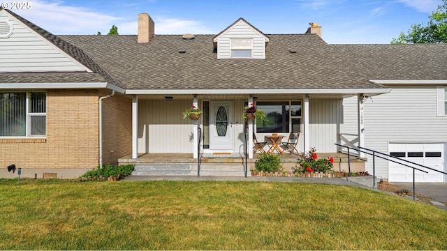 1060 SW 7th St, Hermiston, OR 97838 - view of front of house with a chimney, a porch, a front lawn, an attached garage, and a shingled roof