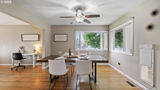1060 SW 7th St, Hermiston, OR 97838 - dining room featuring light wood-type flooring, baseboards, and a ceiling fan