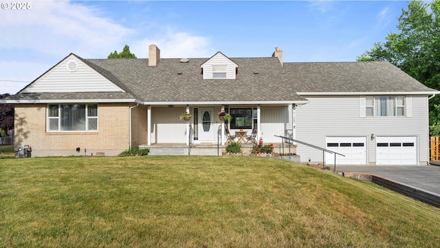 1060 SW 7th St, Hermiston, OR 97838 - view of front facade featuring a chimney, asphalt driveway, a garage, and a porch