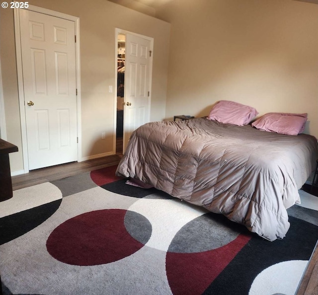 bedroom featuring wood finished floors