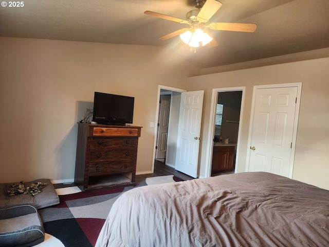 bedroom with baseboards, ceiling fan, and vaulted ceiling
