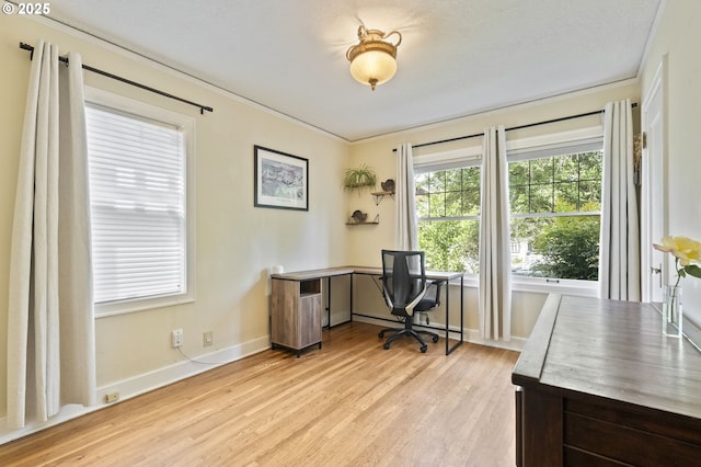 1710 SE 42nd Ave, Portland, OR 97215 - home office with light wood-style flooring, ornamental molding, and baseboards