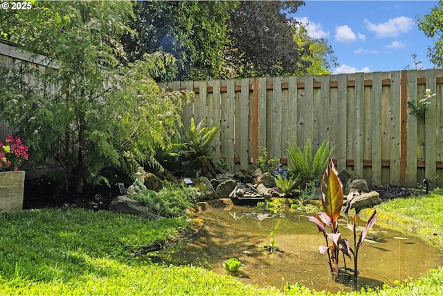 1710 SE 42nd Ave, Portland, OR 97215 - view of yard featuring a garden pond