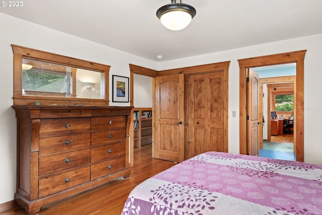 702 B Ave, La Grande, OR 97850 - bedroom featuring a closet and wood finished floors