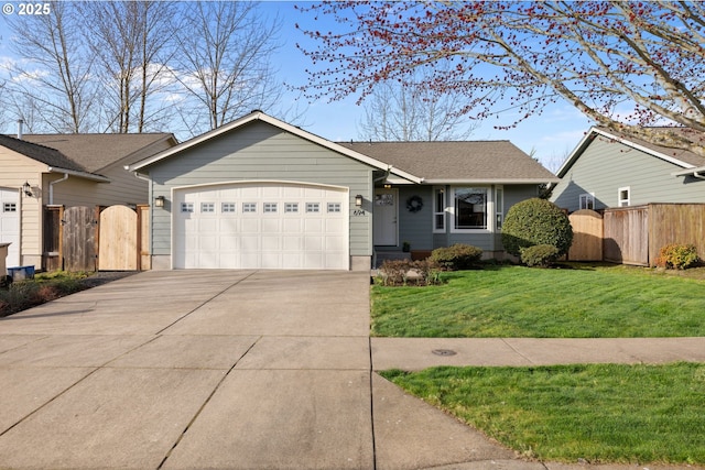 ranch-style home featuring driveway, an attached garage, a gate, fence, and a front yard