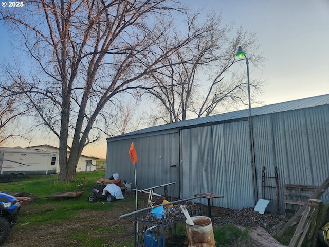 75595 Depot Ln, Irrigon, OR 97844 - outdoor structure at dusk featuring an outbuilding