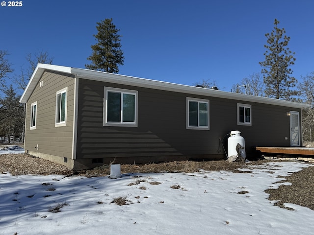 view of snow covered property