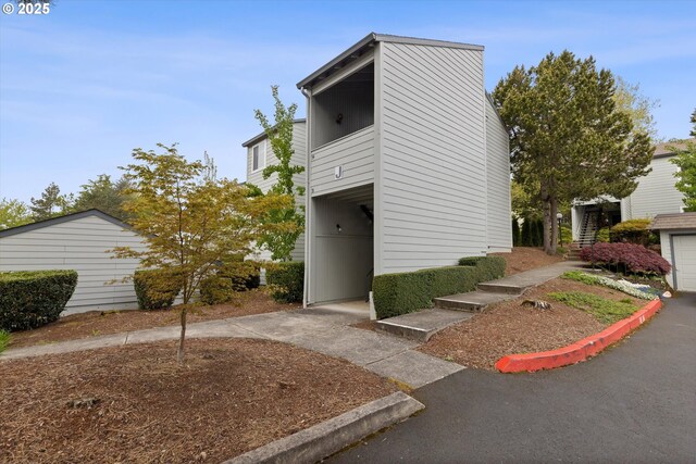 159 SW Florence Ave Unit J53, Gresham, OR 97080 - view of property exterior with stairway