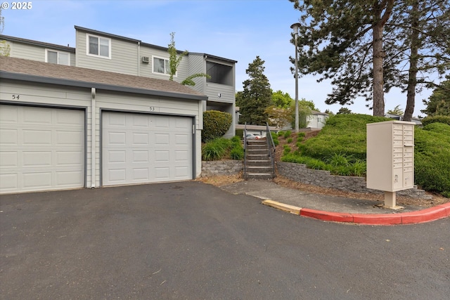 159 SW Florence Ave Unit J53, Gresham, OR 97080 - view of front of property featuring driveway and stairs