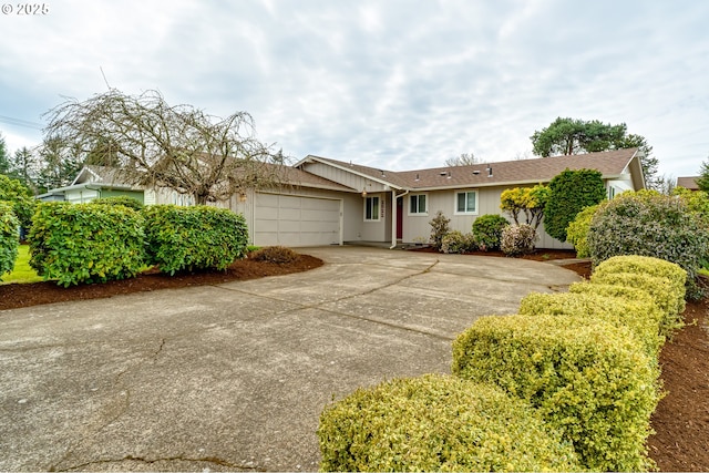 view of front of house with driveway and a garage