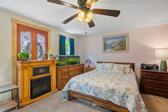 12785 Sutherland Rd, Swisshome, OR 97480 - carpeted bedroom with ceiling fan