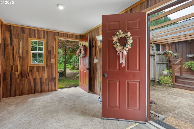 12785 Sutherland Rd, Swisshome, OR 97480 - entrance foyer with wood walls and carpet floors