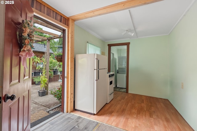 12785 Sutherland Rd, Swisshome, OR 97480 - kitchen with white appliances, light wood finished floors, and crown molding