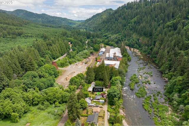 12785 Sutherland Rd, Swisshome, OR 97480 - view of property location with a forest and a mountain backdrop