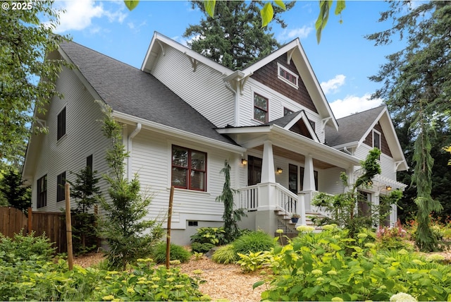 12624 SW 22nd Ave, Lake Oswego, OR 97034 - view of front facade featuring a shingled roof and a porch