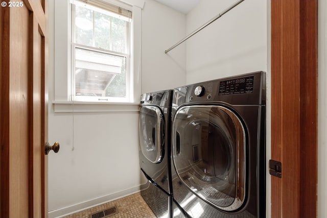 12624 SW 22nd Ave, Lake Oswego, OR 97034 - laundry area with plenty of natural light and washer and clothes dryer