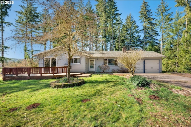 single story home with concrete driveway, a front lawn, a chimney, and an attached garage