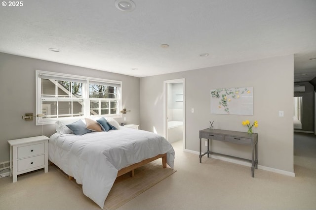 bedroom featuring light carpet, baseboards, connected bathroom, and recessed lighting