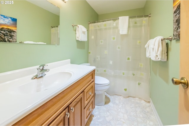 bathroom with vanity, toilet, and a shower with curtain