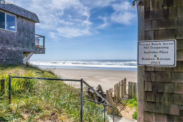 water view with local beach and fence