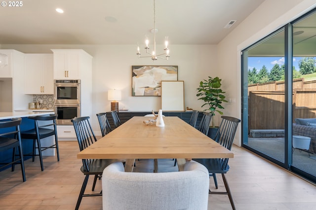 15174 SW 164th Ave Unit L12, Tigard, OR 97224 - dining area featuring a chandelier, light wood-style flooring, and recessed lighting