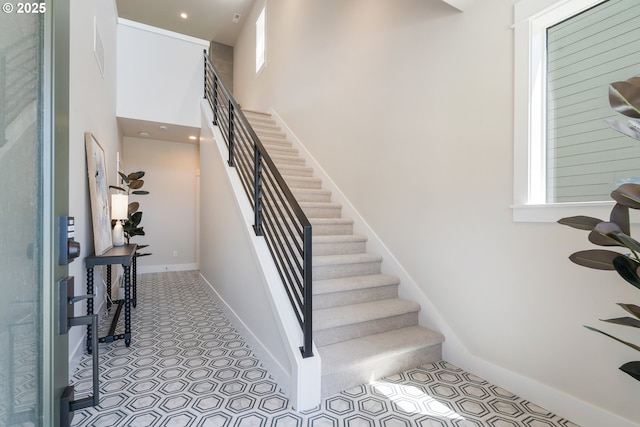 15174 SW 164th Ave Unit L12, Tigard, OR 97224 - stairway with a towering ceiling and baseboards