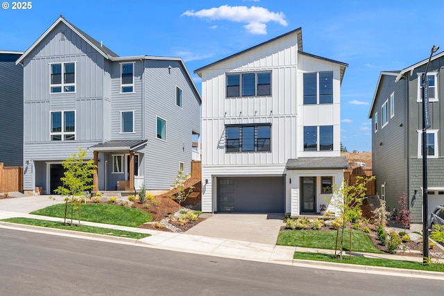 15174 SW 164th Ave Unit L12, Tigard, OR 97224 - view of front of property featuring board and batten siding, driveway, and an attached garage