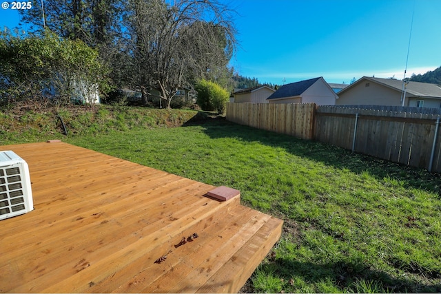 view of yard with a wooden deck