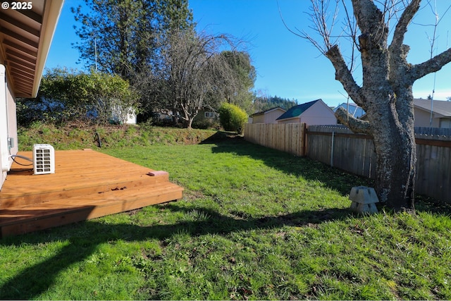 view of yard featuring a wooden deck