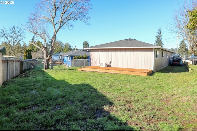 view of yard with a deck