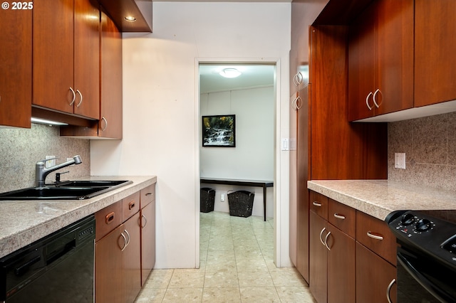 kitchen with light tile patterned floors, black appliances, backsplash, and a sink