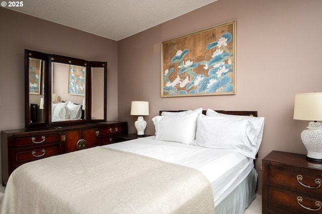 bedroom featuring a textured ceiling