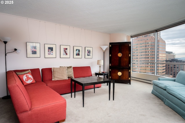 living room featuring light carpet, a view of city, a baseboard heating unit, and a textured ceiling