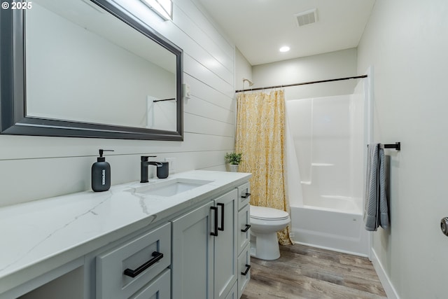 32568 Deberry Rd, Creswell, OR 97426 - bathroom with visible vents, shower / bath combo with shower curtain, toilet, wood finished floors, and vanity