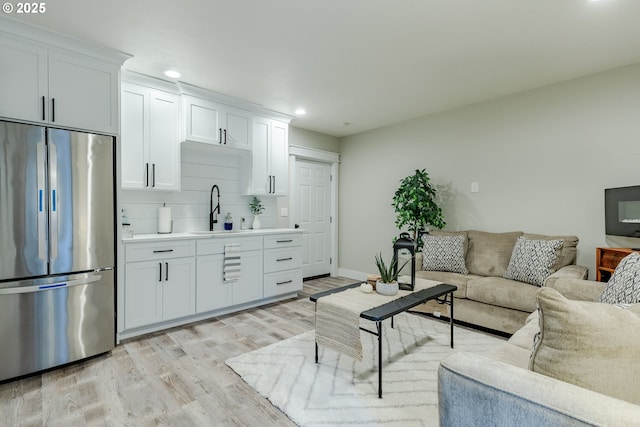 32568 Deberry Rd, Creswell, OR 97426 - living area with light wood finished floors, recessed lighting, and baseboards