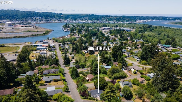 586 11th Ave, Coos Bay, OR 97420 - aerial view of property's location with a large body of water and property parcel outlined