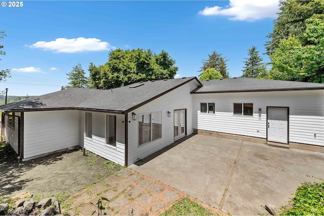 586 11th Ave, Coos Bay, OR 97420 - rear view of house with a patio area and a shingled roof