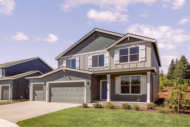 view of front of home with concrete driveway, a porch, board and batten siding, and a front yard