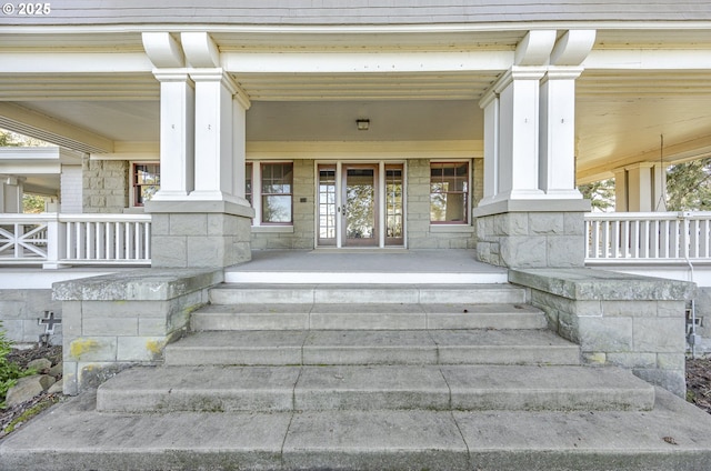 entrance to property featuring covered porch